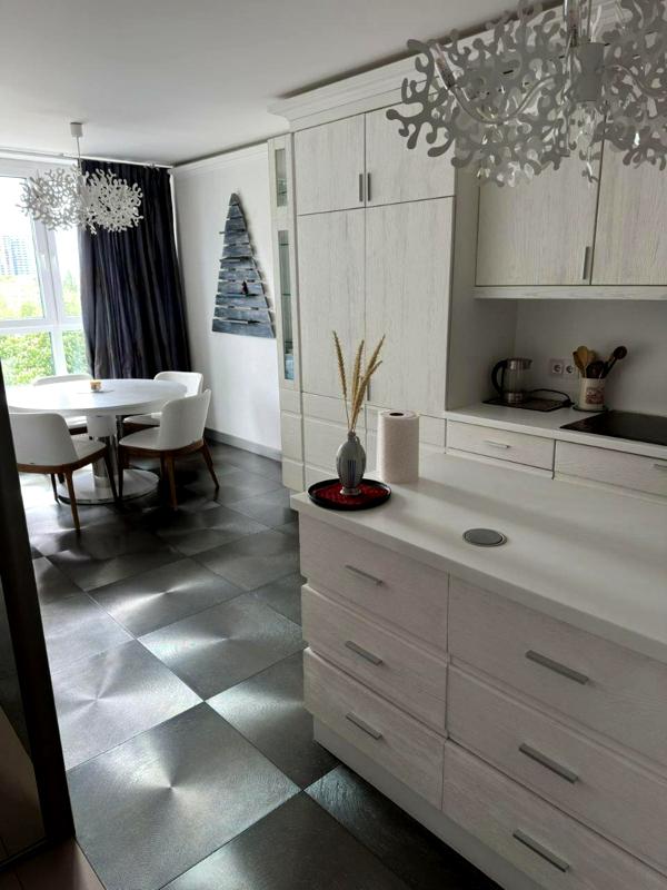 Stylish 4-Room Apartment with Designer Renovation in Prime Location