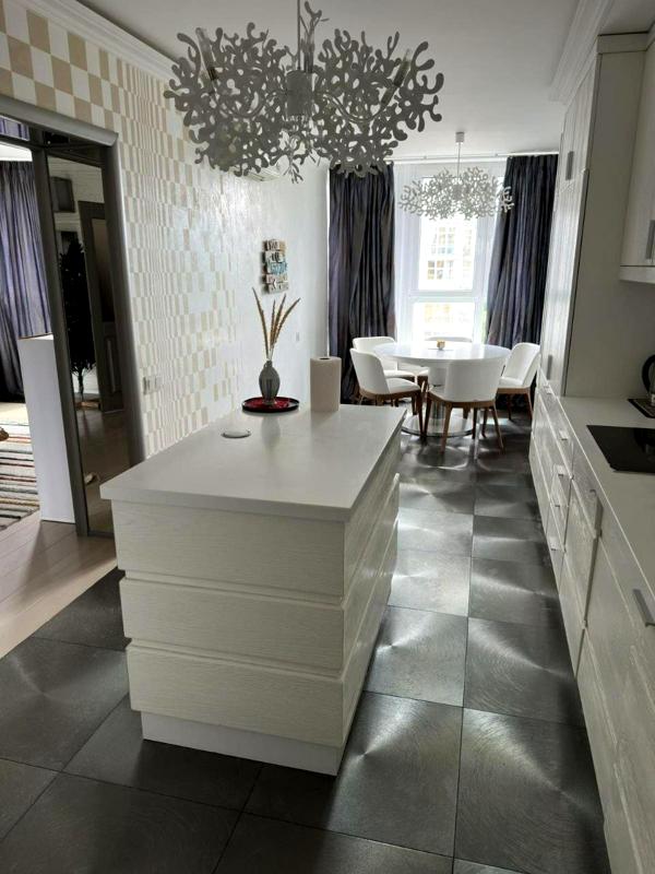 Stylish 4-Room Apartment with Designer Renovation in Prime Location